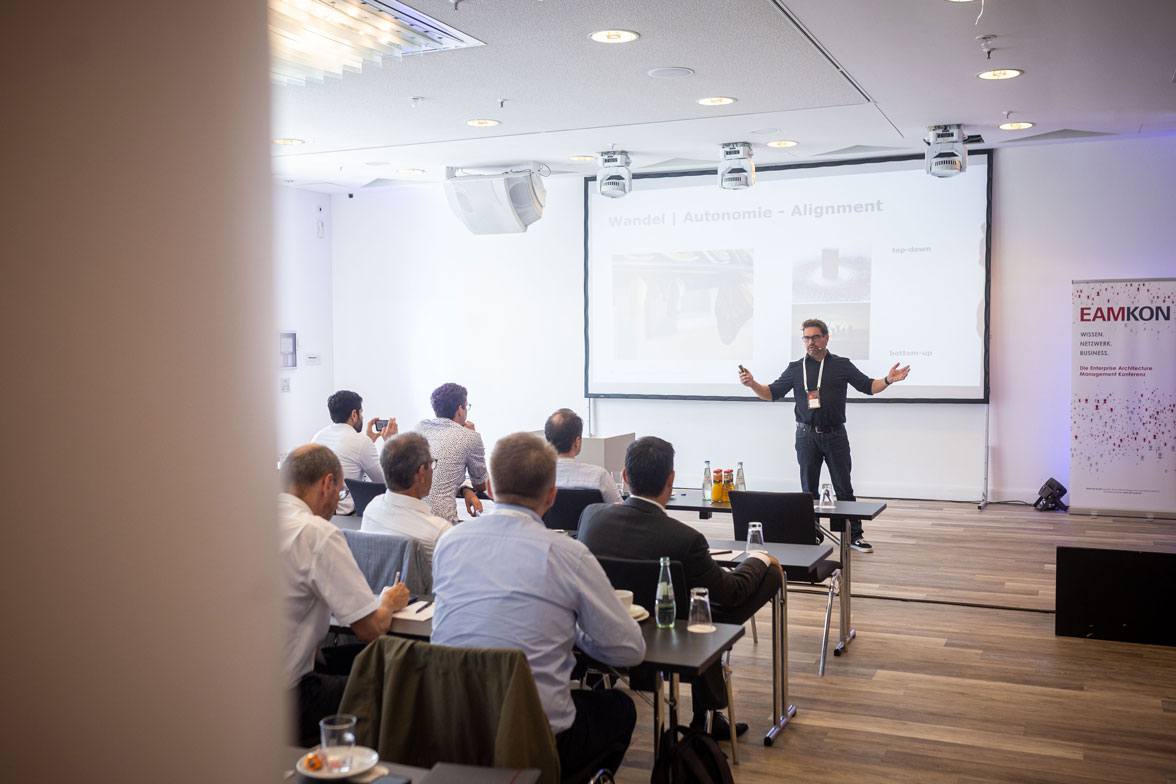 Vortrag von Dr. Thomas Pisar (Director IT Consumer & TEC Transformation, A1 Telekom Austria AG) zum Thema "Agile behind the scene".